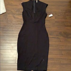 Black Sheath Dress. Low-Cut